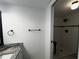 Bathroom features modern vanity and updated shower at 3608 Oak Bark Ln, Brandon, FL 33511
