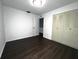 Bright bedroom with laminate flooring, closet and neutral paint at 3608 Oak Bark Ln, Brandon, FL 33511