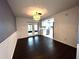 Dining room with chandelier and French doors to screened in patio at 3608 Oak Bark Ln, Brandon, FL 33511