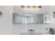 Elegant bathroom featuring a modern vanity with a sleek, minimalist design and unique tile work at 375 Wellington Ave, Oldsmar, FL 34677