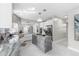 Well-appointed kitchen with a central island, modern appliances, and sleek cabinetry at 375 Wellington Ave, Oldsmar, FL 34677