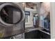 Efficient laundry area equipped with a washer, dryer, sink, and counter space at 375 Wellington Ave, Oldsmar, FL 34677