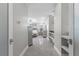 View into the primary bedroom suite with ensuite bathroom and fireplace at 375 Wellington Ave, Oldsmar, FL 34677