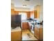 Well-equipped kitchen with modern appliances, ample cabinetry, and a functional layout for cooking at 425 Highland Ct, Dunedin, FL 34698