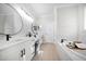 Modern bathroom boasting double vanity, a soaking tub, and sleek fixtures at 434 Arch Ridge Loop # 434, Seffner, FL 33584