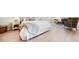 Serene bedroom featuring neutral tones, a comfortable bed, and a cozy seating area at 434 Arch Ridge Loop # 434, Seffner, FL 33584