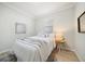 Cozy bedroom with natural light, simple decor, and a serene atmosphere perfect for relaxation at 434 Arch Ridge Loop # 434, Seffner, FL 33584