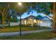 Charming single-story home with well-manicured lawn, mature trees, and inviting curb appeal at 434 Arch Ridge Loop # 434, Seffner, FL 33584