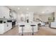 Contemporary kitchen featuring stainless steel appliances, quartz countertops, and breakfast bar at 434 Arch Ridge Loop # 434, Seffner, FL 33584