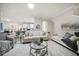 Bright living room featuring neutral colors, modern decor, and an open floorplan at 434 Arch Ridge Loop # 434, Seffner, FL 33584