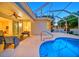 Inviting pool area with a covered patio, perfect for relaxing and entertaining outdoors at 434 Arch Ridge Loop # 434, Seffner, FL 33584