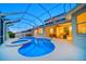 Sparkling screened-in pool and spa with a spacious patio area perfect for outdoor relaxation at 434 Arch Ridge Loop # 434, Seffner, FL 33584