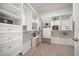 Spacious walk-in closet with custom shelving, drawers, and ample storage space at 434 Arch Ridge Loop # 434, Seffner, FL 33584