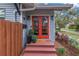 Inviting entryway with red door and a 