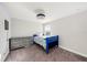 bedroom with single bed, dresser, carpet, and one window providing natural light at 4607 Ballantrae Boulevard, Land O Lakes, FL 34638