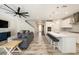 Spacious living area leading into an open kitchen with a large island and bar seating at 4607 Ballantrae Boulevard, Land O Lakes, FL 34638
