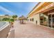 Spacious patio with tiki hut and nearby lake views, creating an inviting outdoor retreat at 4750 Cove Cir # 706, St Petersburg, FL 33708