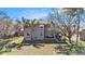 Spacious backyard with covered gazebo, patio, and lush green lawn, perfect for outdoor living at 5843 Justicia Loop, Land O Lakes, FL 34639