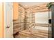 Bathroom boasts a stand alone glass shower and a soaking tub at 5843 Justicia Loop, Land O Lakes, FL 34639