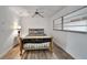 Cozy bedroom with a decorative metal bed frame, wood floors, and a bright window at 5850 21St N St # 18, St Petersburg, FL 33714