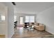 Cozy living space with hardwood floors, inviting sofa, and dining area in the background at 5850 21St N St # 18, St Petersburg, FL 33714