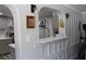 Kitchen nook with decorative elements, featuring gray cabinets and stainless steel appliances at 1012 Greenleaf Way, Tarpon Springs, FL 34689