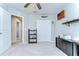 Spacious bedroom features a ceiling fan, ample lighting, and a convenient closet at 11605 Cleyera Ct, Riverview, FL 33579