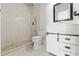 Bathroom featuring a walk-in shower, vanity, and modern fixtures at 1214 Windsor Cir, Brandon, FL 33510
