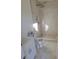 Bathroom featuring tiled shower, pebble floor, toilet, and vanity with modern fixtures at 1214 Windsor Cir, Brandon, FL 33510