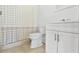 Traditional white bathroom with a shower/tub and a classic vanity at 1214 Windsor Cir, Brandon, FL 33510