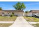 Charming single-story home with well-maintained lawn at 1214 Windsor Cir, Brandon, FL 33510
