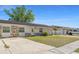 Charming single-story home featuring stone accents, a well-manicured lawn, and an attached garage at 1214 Windsor Cir, Brandon, FL 33510