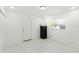 A modern kitchen space with clean white walls and marble tile floor at 1214 Windsor Cir, Brandon, FL 33510