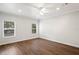 Large bedroom with natural light, wood-style flooring, and a ceiling fan at 1515 14Th S St, St Petersburg, FL 33705