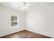 A bright room with a modern ceiling fan and a window at 1515 14Th S St, St Petersburg, FL 33705
