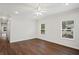 Spacious bedroom with two bright windows and wood-style flooring at 1515 14Th S St, St Petersburg, FL 33705