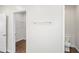 A spacious walk-in closet with built-in shelving for optimal storage, and an adjacent toilet at 1515 14Th S St, St Petersburg, FL 33705
