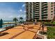 Well-maintained pool deck area with ocean view at beachfront condo at 1560 Gulf Blvd # 502, Clearwater Beach, FL 33767