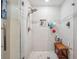 Updated bathroom showcasing a glass enclosed shower and a built-in bench at 1615 Redmond Brook Ln, Ruskin, FL 33570