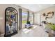 Cozy sitting room bathed in natural light, featuring neutral tones and comfortable seating at 1615 Redmond Brook Ln, Ruskin, FL 33570