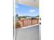 Balcony with orange railing overlooking a street at 15 29Th N St # Lot 7, St Petersburg, FL 33713