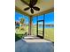 Screened lanai offers views of the backyard and a picturesque waterfront view at 1945 Fruitridge St, Brandon, FL 33510