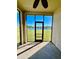 Lanai offers views of the backyard and a picturesque waterfront view at 1945 Fruitridge St, Brandon, FL 33510