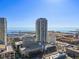 Breathtaking aerial view showcasing high-rise condos and the waterfront with marina, highlighting the city's coastal charm at 301 1St S St # 1201, St Petersburg, FL 33701