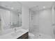 Modern bathroom featuring frameless glass shower, sleek vanity and updated fixtures at 301 1St S St # 1201, St Petersburg, FL 33701