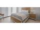 Cozy bedroom with natural light, stylish furnishings, and a serene ambiance at 301 1St S St # 1201, St Petersburg, FL 33701