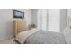 Well-lit bedroom featuring a large window and stylishly appointed furnishings at 301 1St S St # 1201, St Petersburg, FL 33701