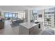 Open-concept kitchen and living area with stainless appliances, modern design, and stunning views at 301 1St S St # 1201, St Petersburg, FL 33701