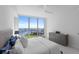 Bright and airy bedroom featuring a large window with stunning water and stadium views at 301 1St S St # 1201, St Petersburg, FL 33701