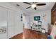 Playful room features hardwood floors, a whimsical mural, built in bookshelf, and large closets at 355 21St Ne Ave, St Petersburg, FL 33704